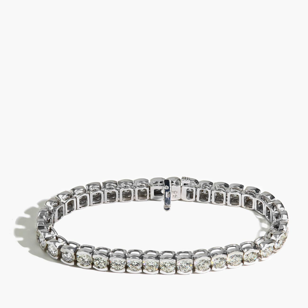 15 Carat Half Bezel Set Tennis Bracelet in 18k White Gold