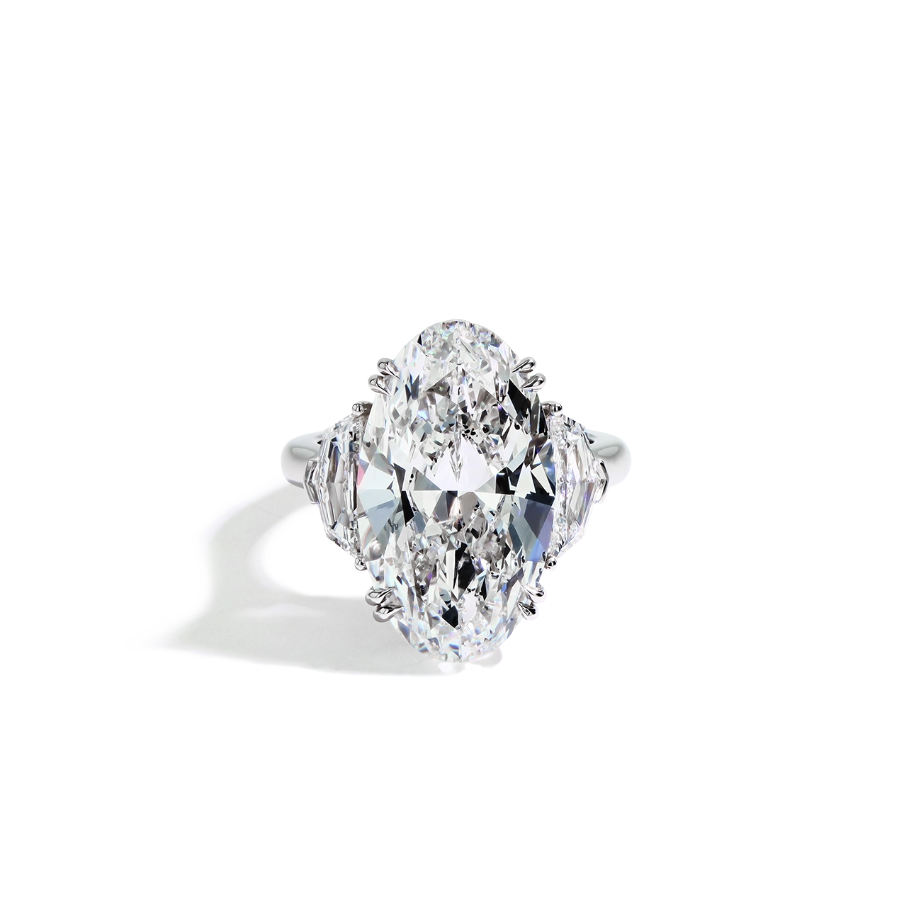 11 Carat Diamond Oval and Side Stone Ring