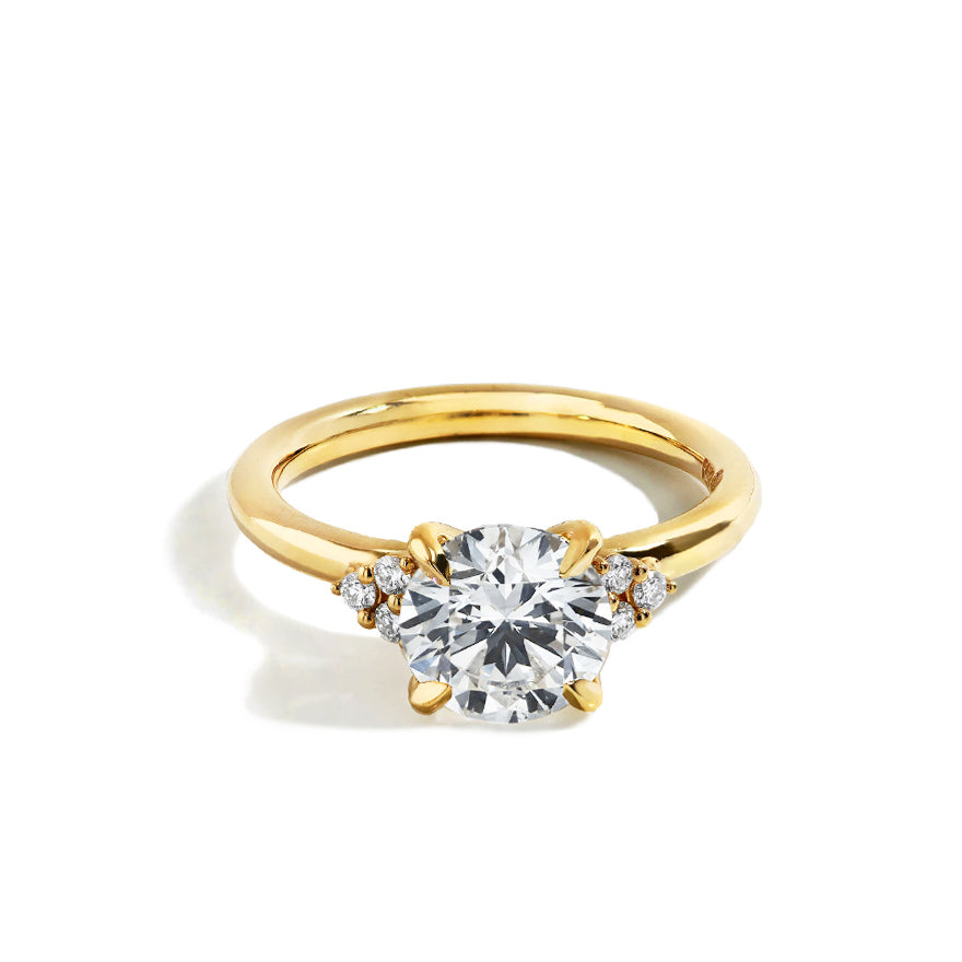 2 Carat Round Diamond With Trio Side Stones Engagement Ring