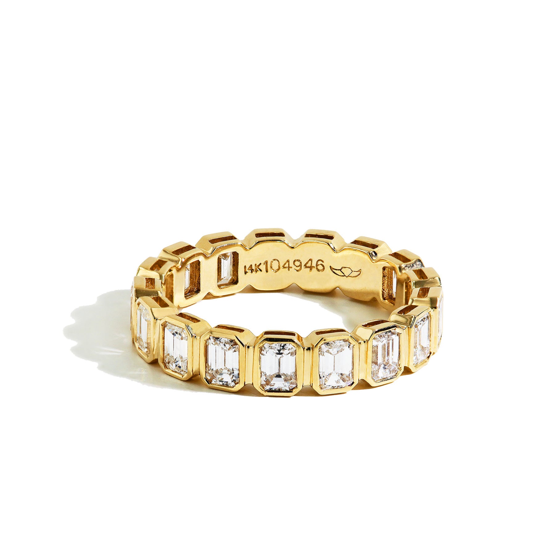Gold Bezel Set Emerald Cut Eternity Band