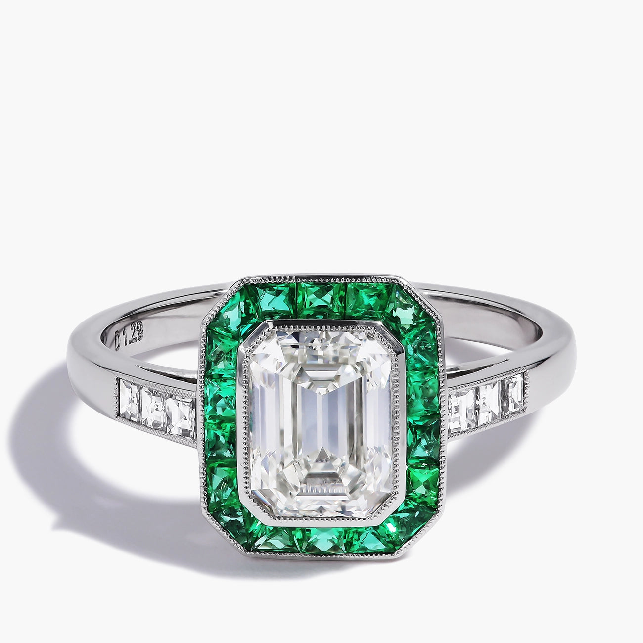 Emerald-Cut Diamond and Emerald Halo Ring