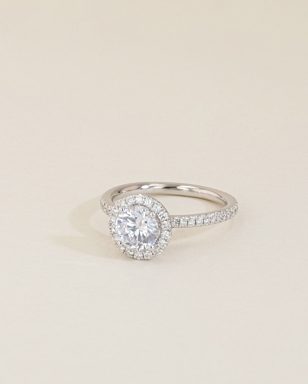 The Round Halo Pavé Engagement Ring in Rose Gold