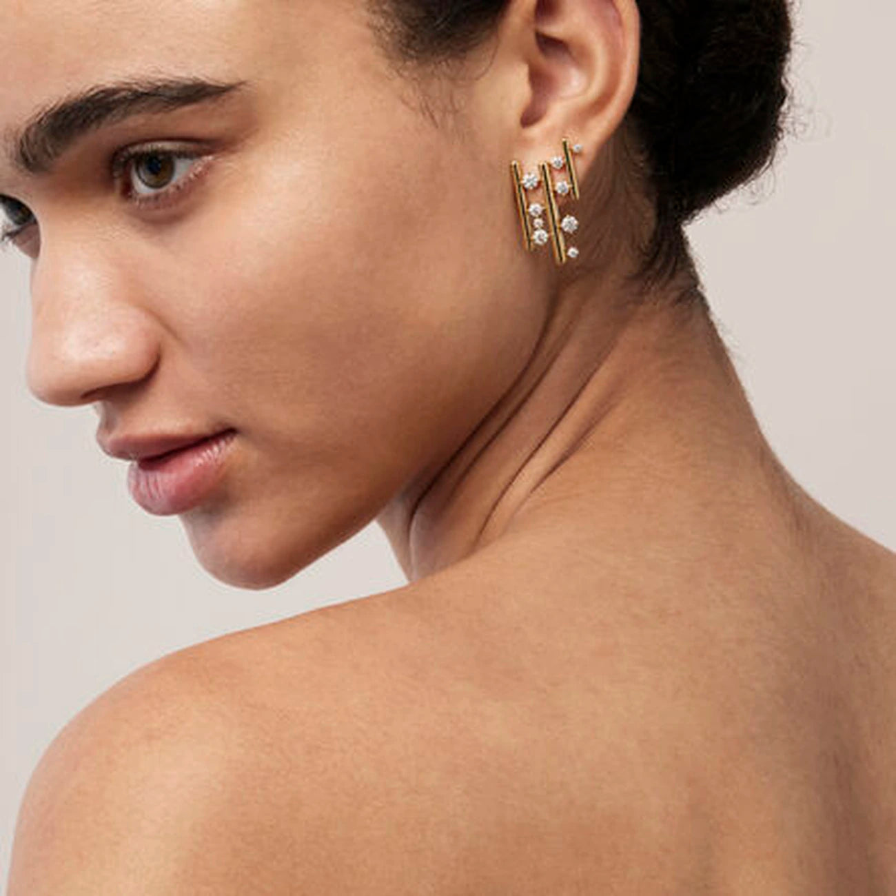 Hearts on Fire Barre Multi-Row Climber Earrings in 18k Yellow Gold on model