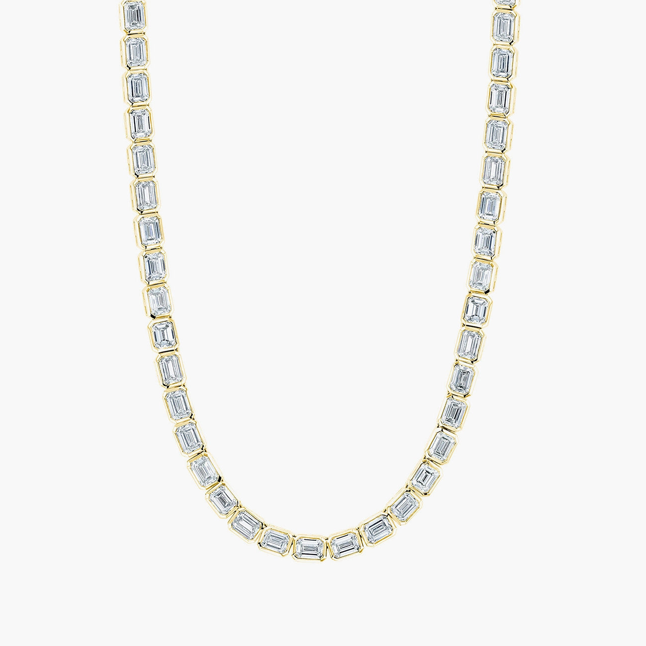 East-west emerald diamond tennis necklace in 18K yellow gold with 10ct diamonds, front view