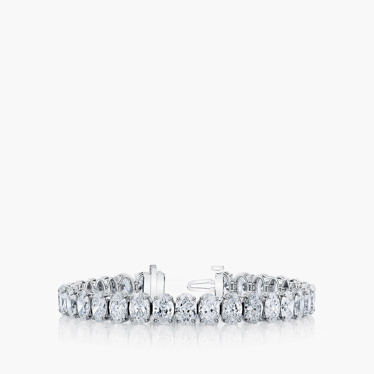 North-south oval diamond tennis bracelet in platinum with 8.1ct diamonds, front view