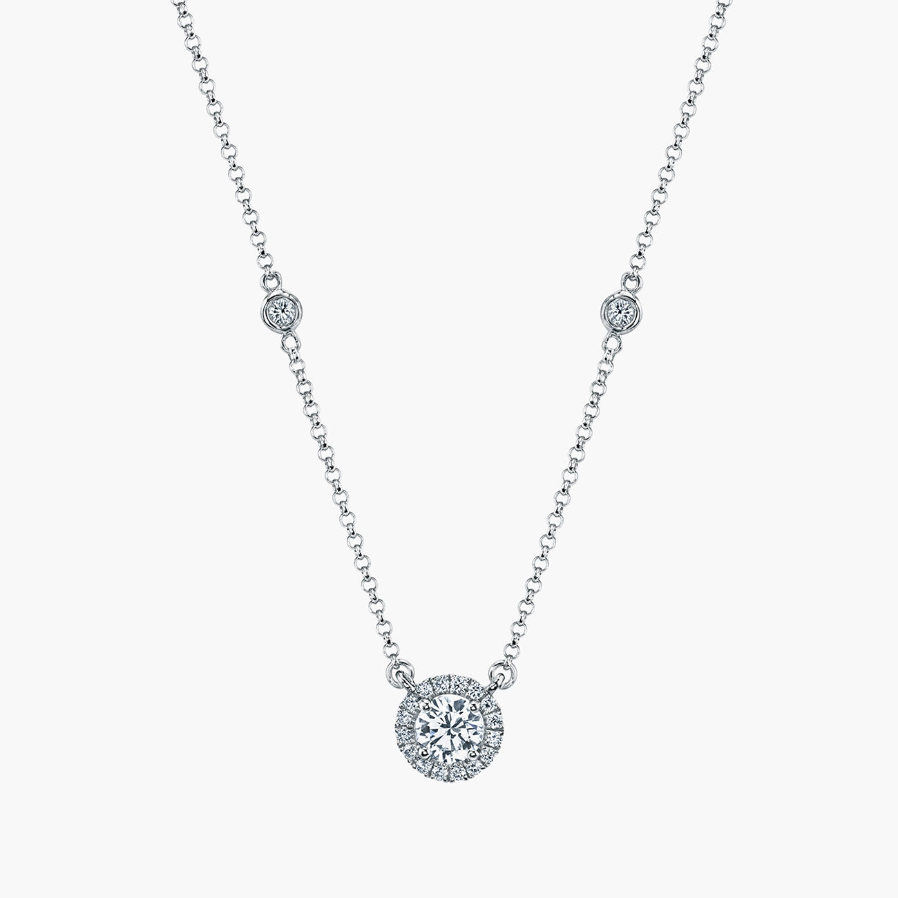 Round diamond halo pendant in 18K white gold, front view