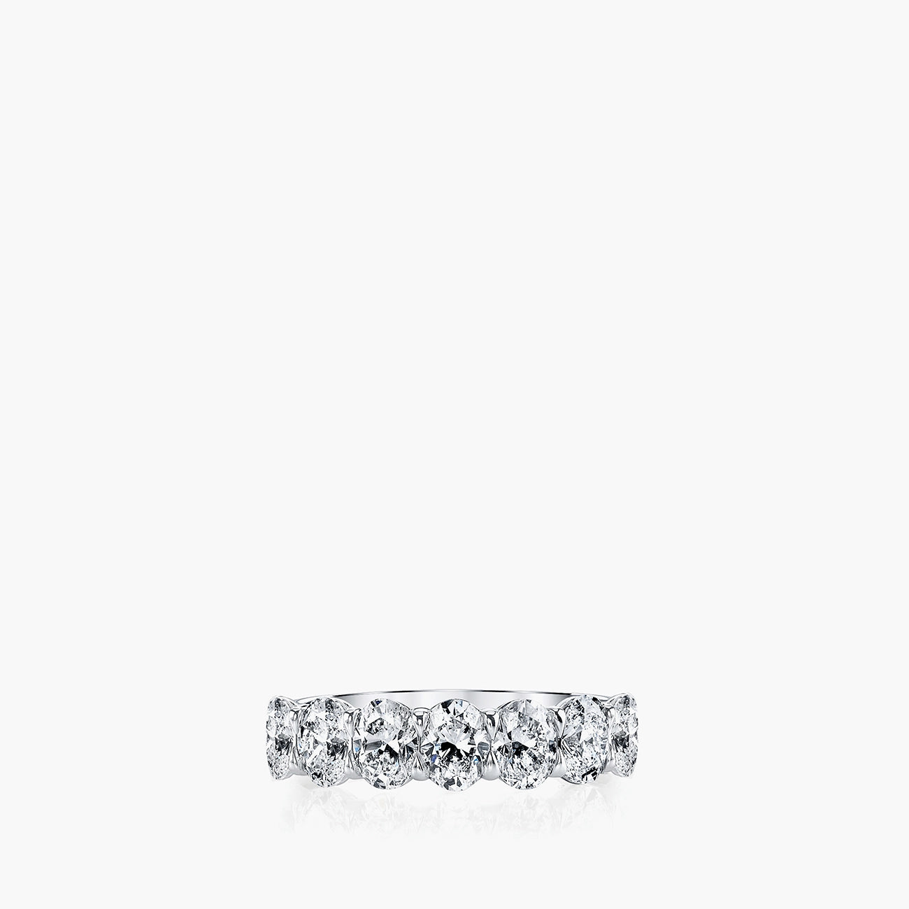 Seven-stone oval diamond shared prong band in platinum showing all seven stones, front view
