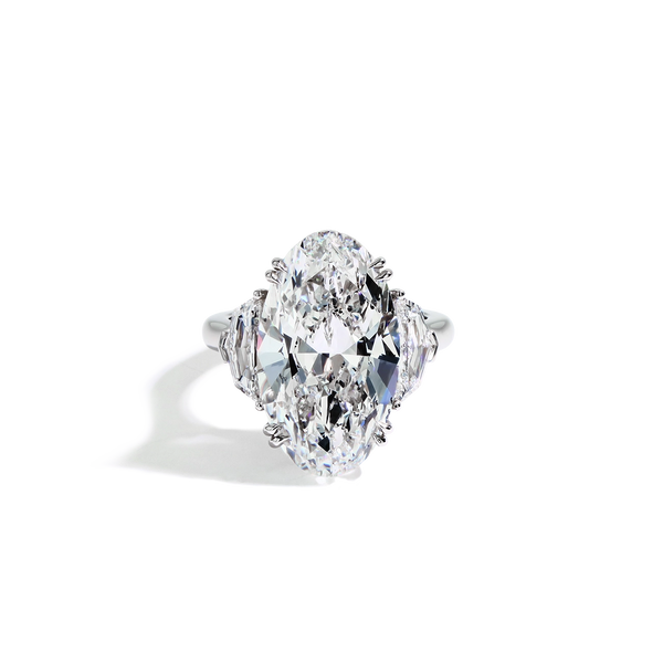 11 Carat Diamond Oval and Side Stone Ring