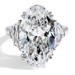 11 Carat Diamond Oval and Side Stone Ring