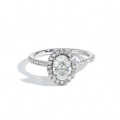 0.70 Carat Oval Halo Engagement Ring - E/SI2 GIA Certified - Private Label product