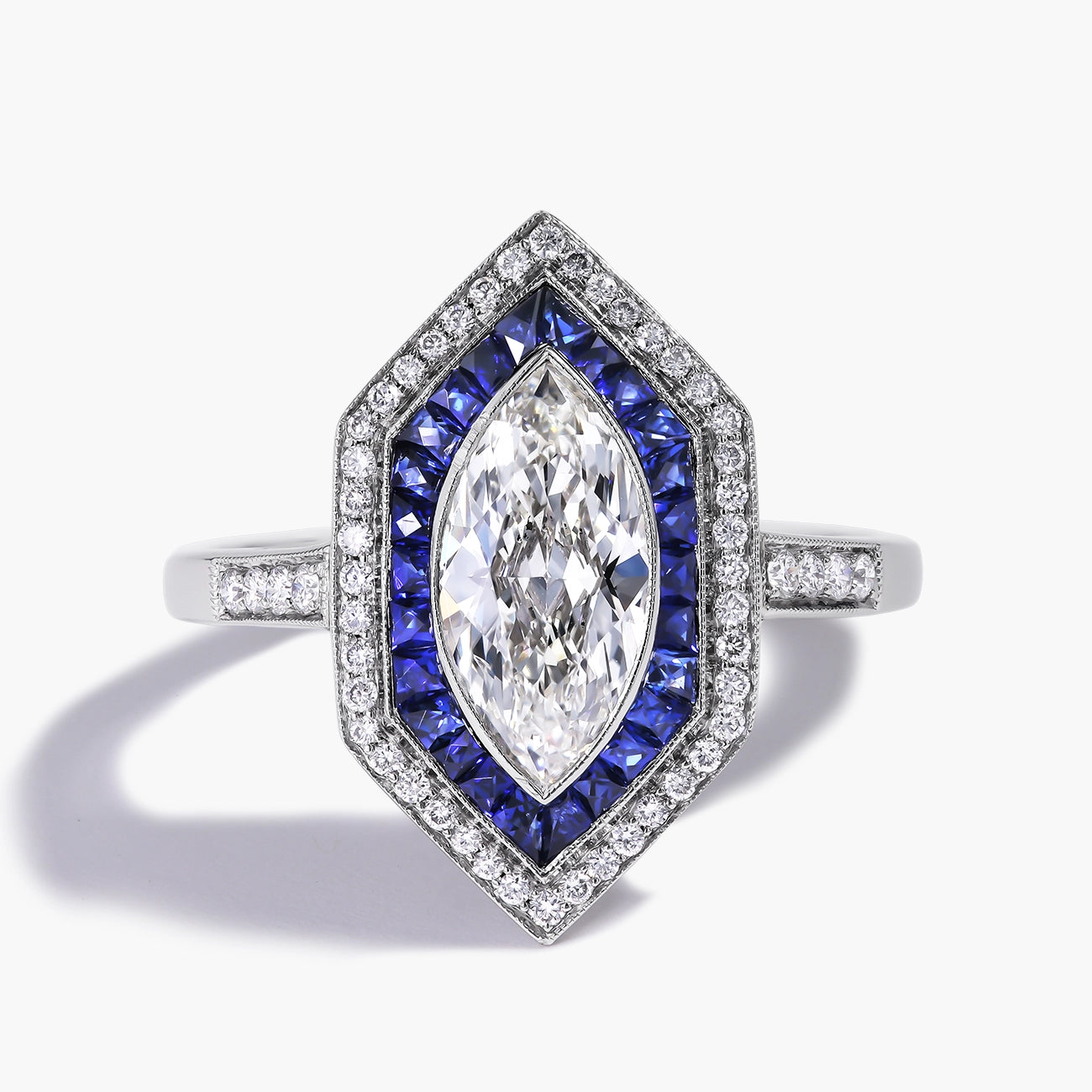 Marquise Diamond and Blue Sapphire Halo Ring