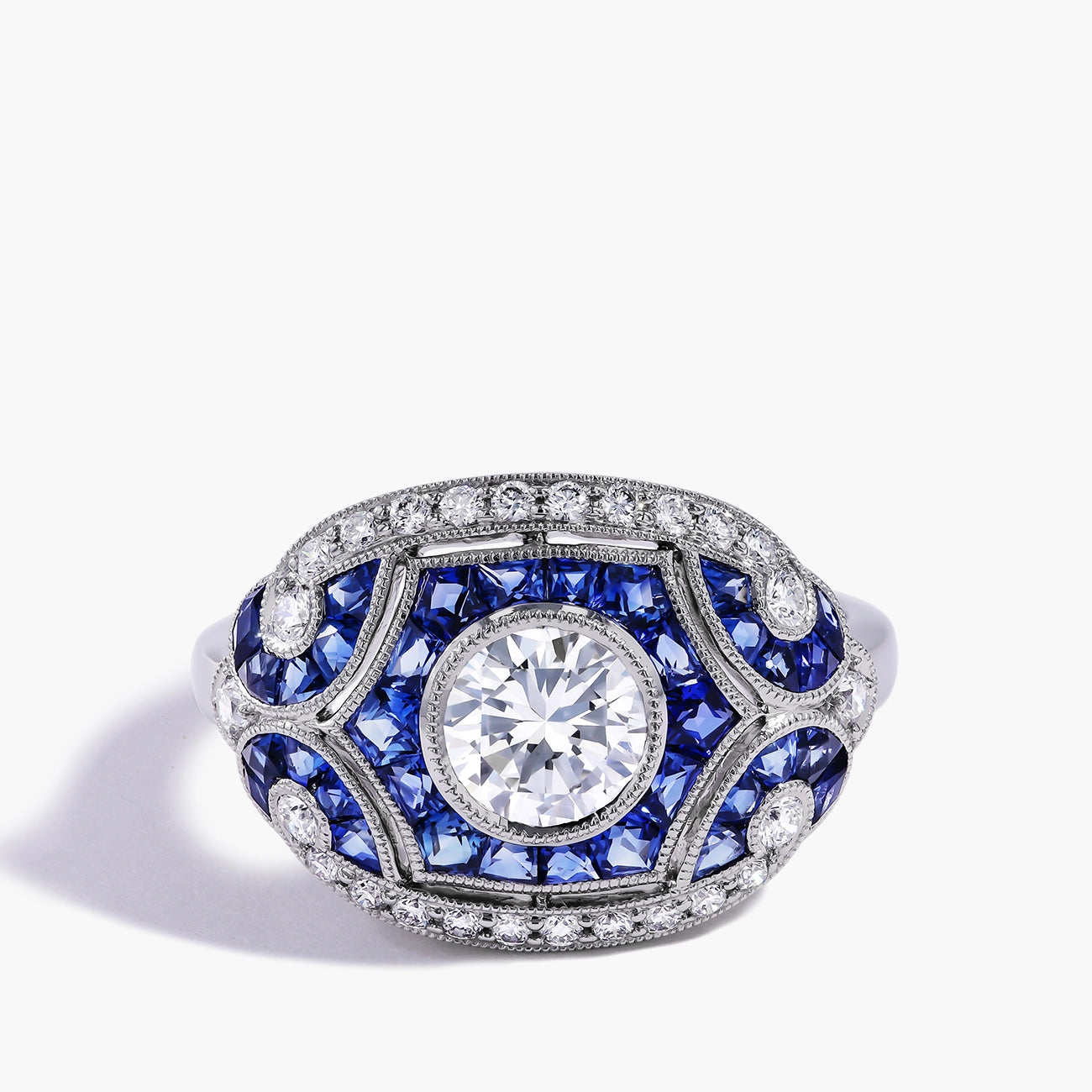 Round Diamond and Blue Sapphire Ring