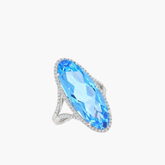 Oval Blue Topaz and Diamond Pavé Halo Ring