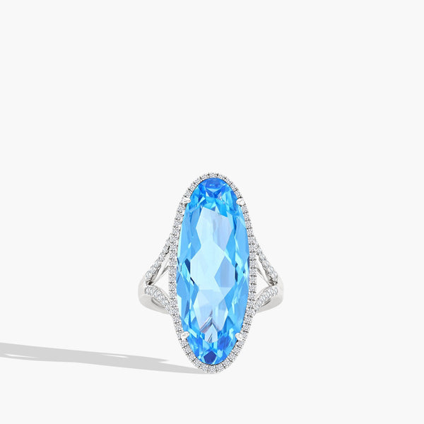 Oval Blue Topaz and Diamond Pavé Halo Ring