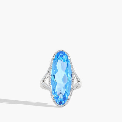 Oval Blue Topaz and Diamond Pavé Halo Ring - Private Label product