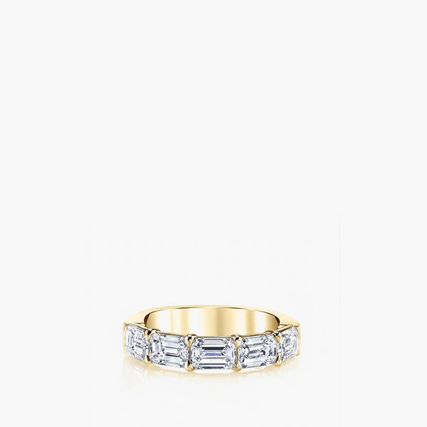 East-west emerald-cut diamond band in 18K yellow gold, front view