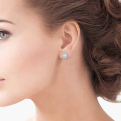 1 Carat Emerald Cut Illusion Diamond Stud Earrings in 14k White Gold