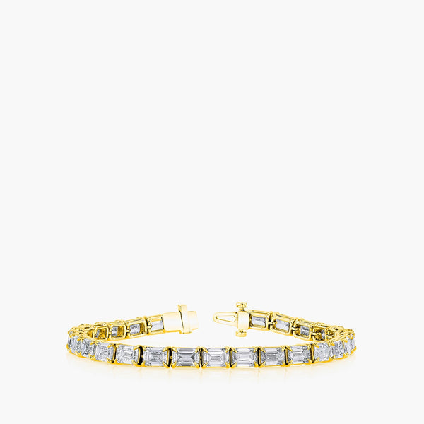 East-west emerald diamond tennis bracelet in 18K yellow gold with 9.5ct diamonds,front view