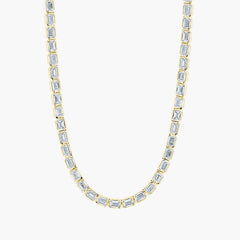 East-west emerald diamond tennis necklace in 18K yellow gold with 10ct diamonds, front view