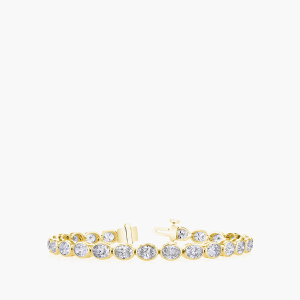 ast-west oval diamond tennis bracelet in 18K yellow gold with 7.25ct diamonds, front view