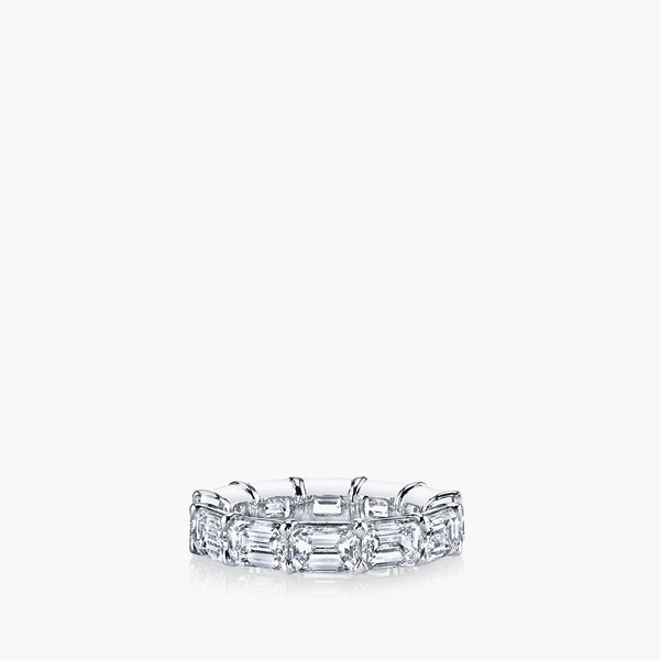 East-west emerald-cut diamond eternity band in platinum, front view