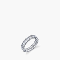 Emerald-cut diamond eternity band in platinum, top-down view