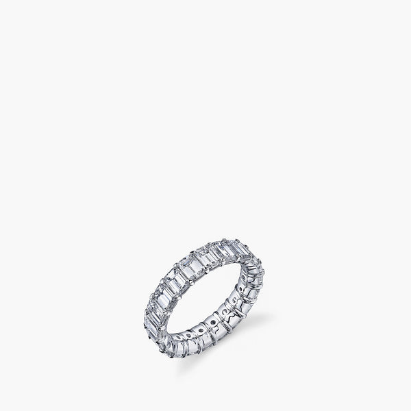 Emerald-cut diamond eternity band in platinum, top-down view