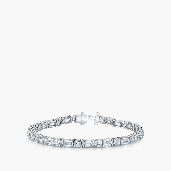 Emerald and round diamond tennis bracelet in platinum with 7.7ct diamonds, front view
