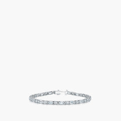 Emerald-cut and round diamond tennis bracelet in 18K white gold, front view 