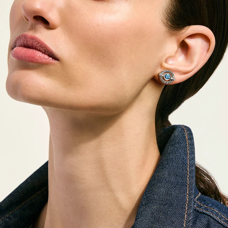 John Hardy Icon Stud Earrings in sterling silver with Swiss blue topaz, worn on ear
