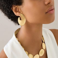 Marco Bicego Lunaria 18K Yellow Gold Wrap Earrings on a woman