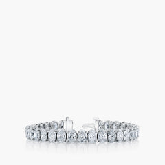 North-south oval diamond tennis bracelet in platinum with 8.1ct diamonds, front view