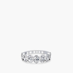 Oval-cut diamond bezel-set eternity band in 18K white gold, front view