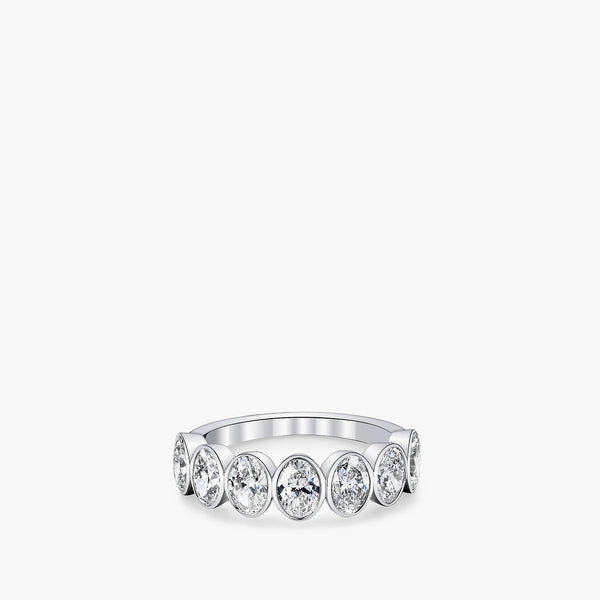 Oval-cut diamond bezel-set eternity band in 18K white gold, front view
