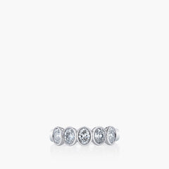 Oval diamond bezel-set eternity band in platinum, front view