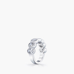Oval diamond eternity band side profile showing bezel setting