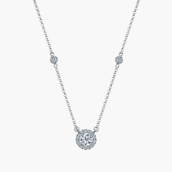 Round diamond halo pendant in 18K white gold, front view