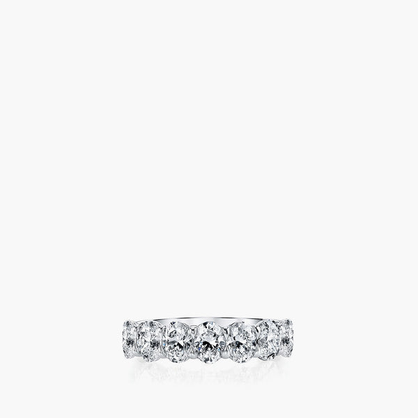 Seven-stone oval diamond shared prong band in platinum showing all seven stones, front view