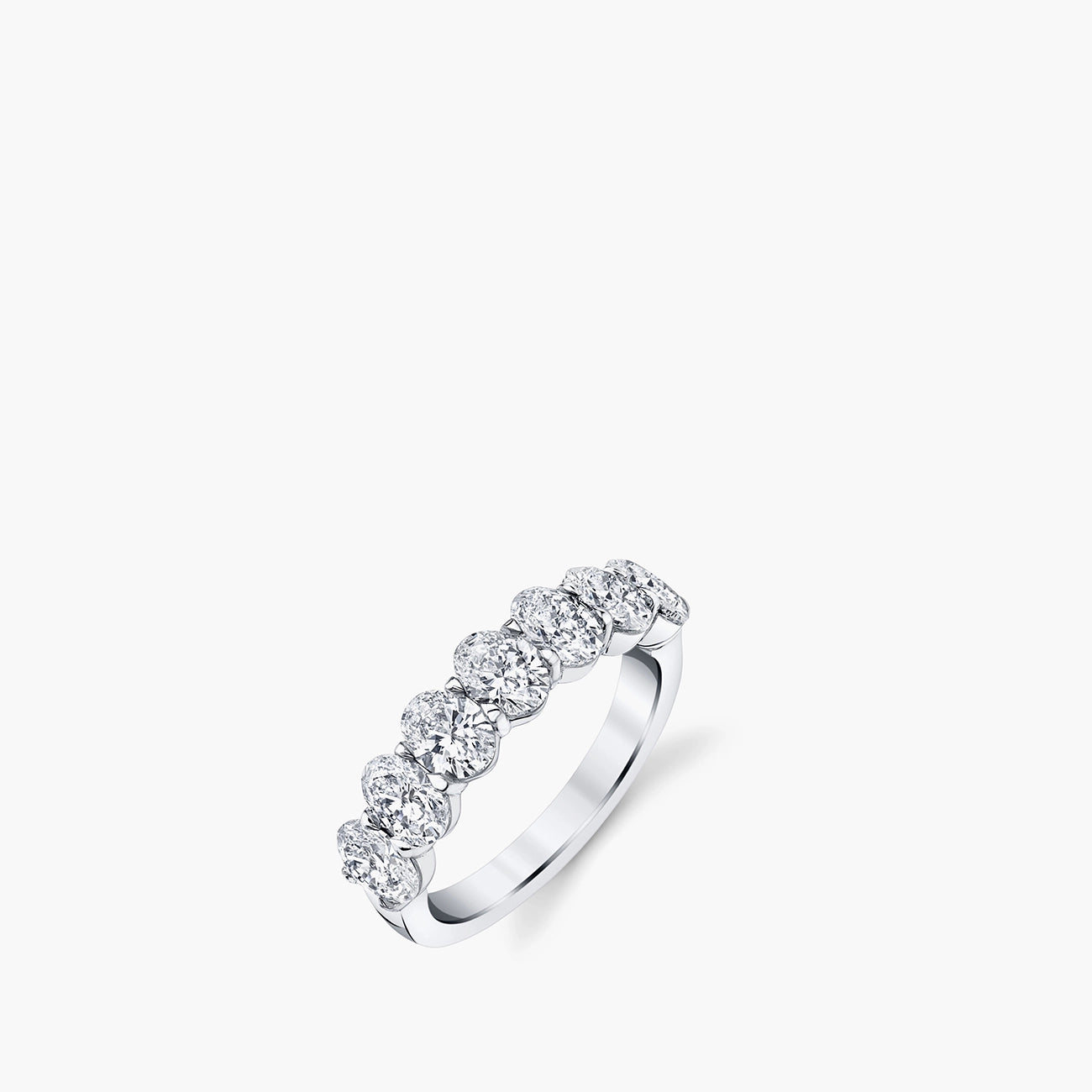 Seven-stone oval diamond shared prong band in platinum showing all seven stones, top view