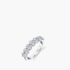 Seven-stone oval diamond shared prong band in platinum showing all seven stones, top view