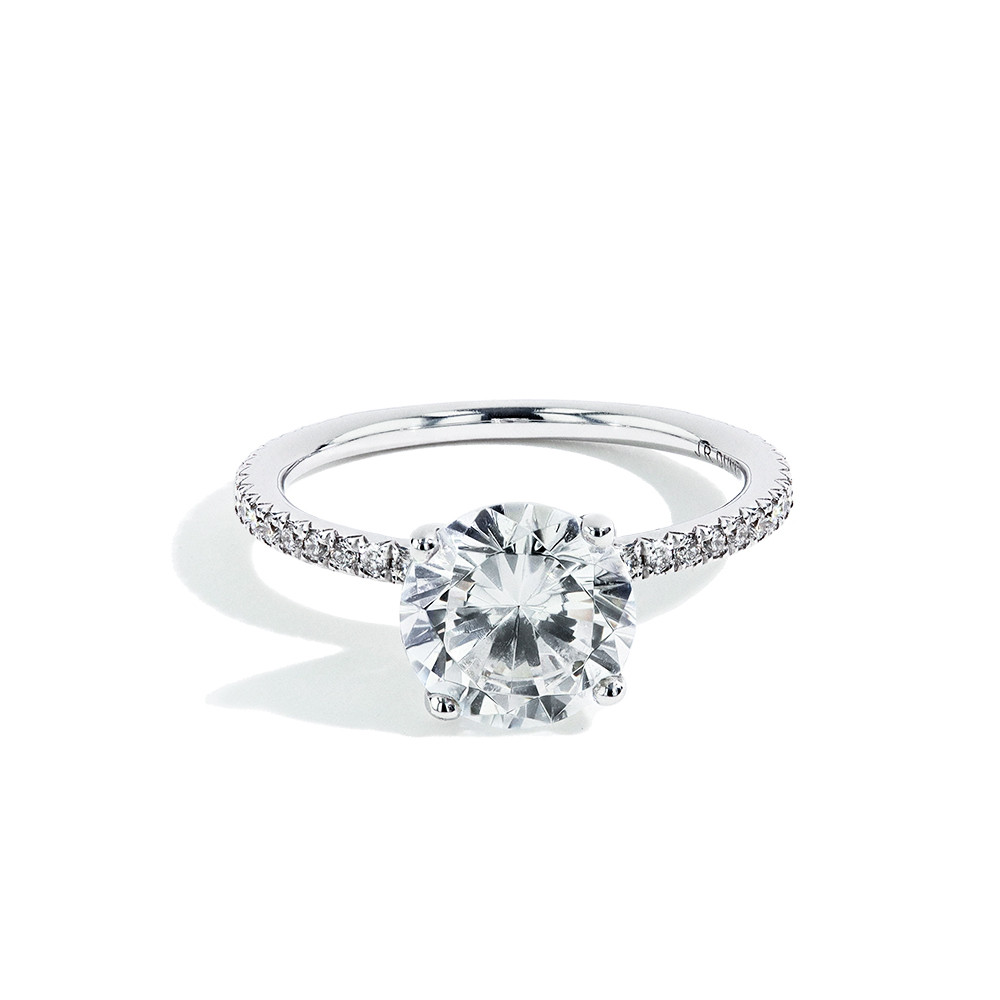 The Round Solitaire Pave Engagement Ring in Platinum front view