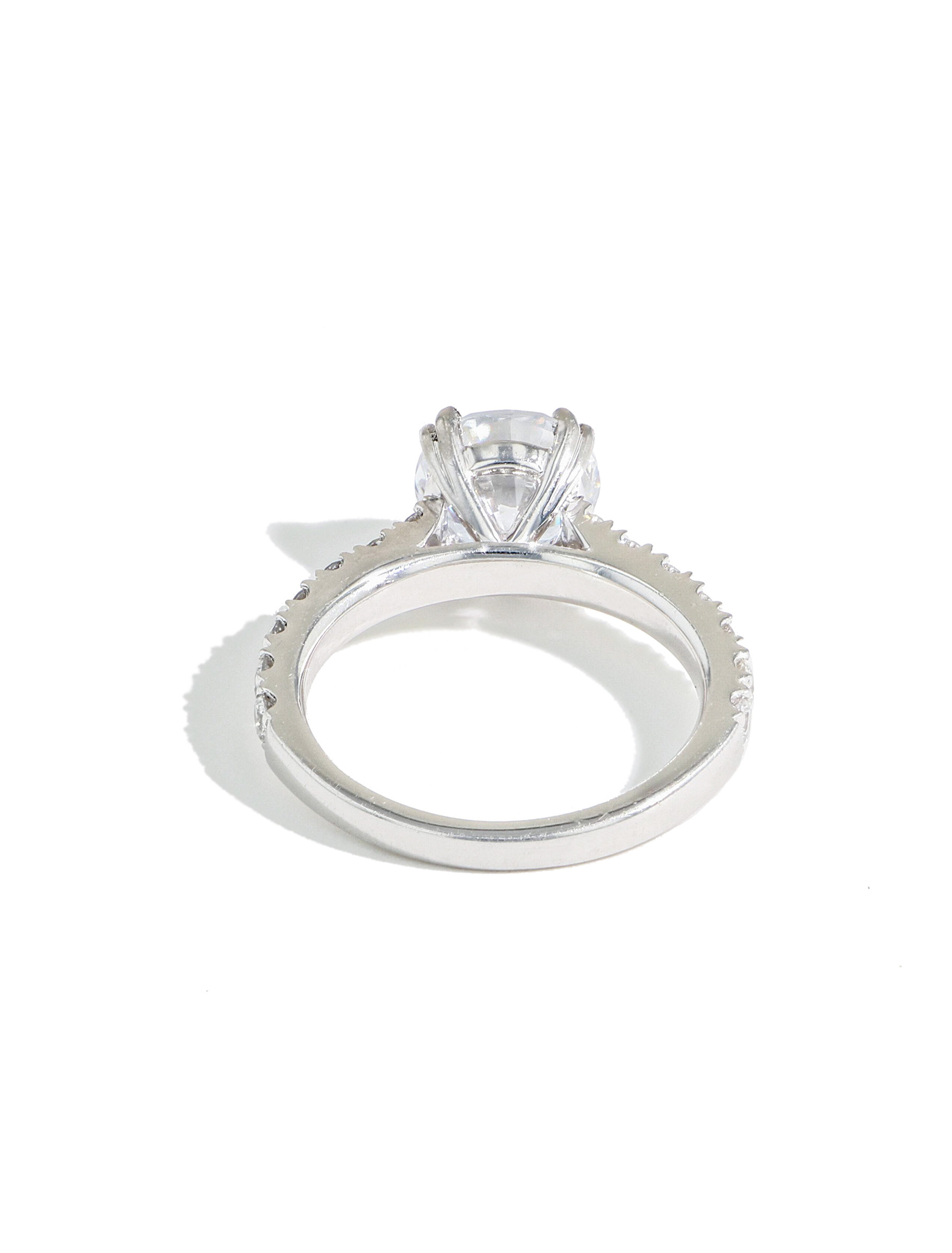 The Round Solitaire Pave Engagement Ring Setting in Platinum back view