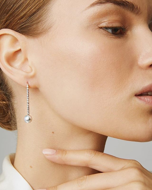 Carbon & Hyde Diamond Pearl Drop Earrings on model 