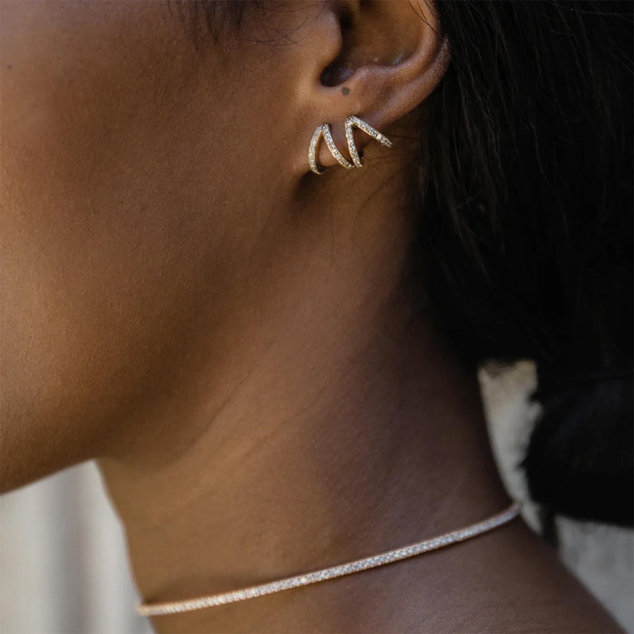 Rose Gold Diamond Split Huggie Earrings by Carbon & Hyde on Model 